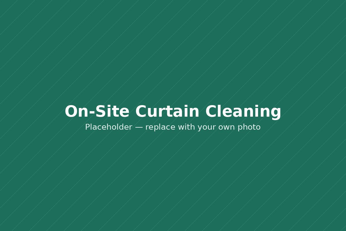 Curtains being cleaned on-site while hanging